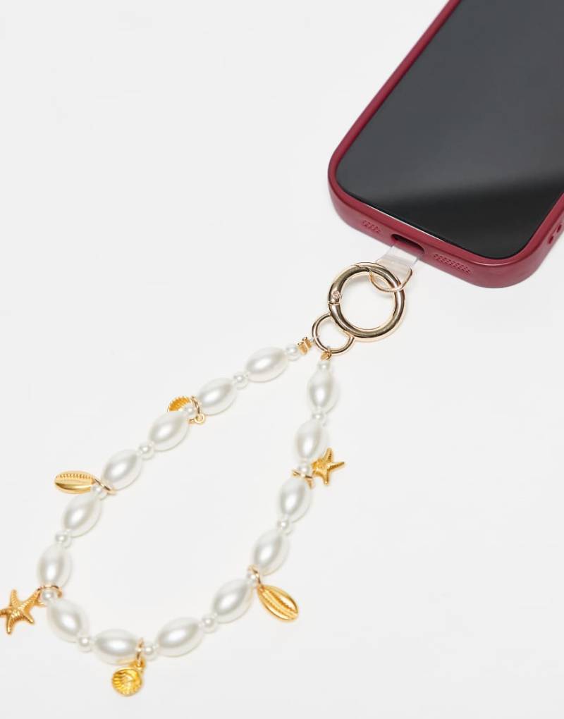 Accessorize - Handy-Handschlaufe in Weiß mit Muschel- und Perlenanhängern von Accessorize