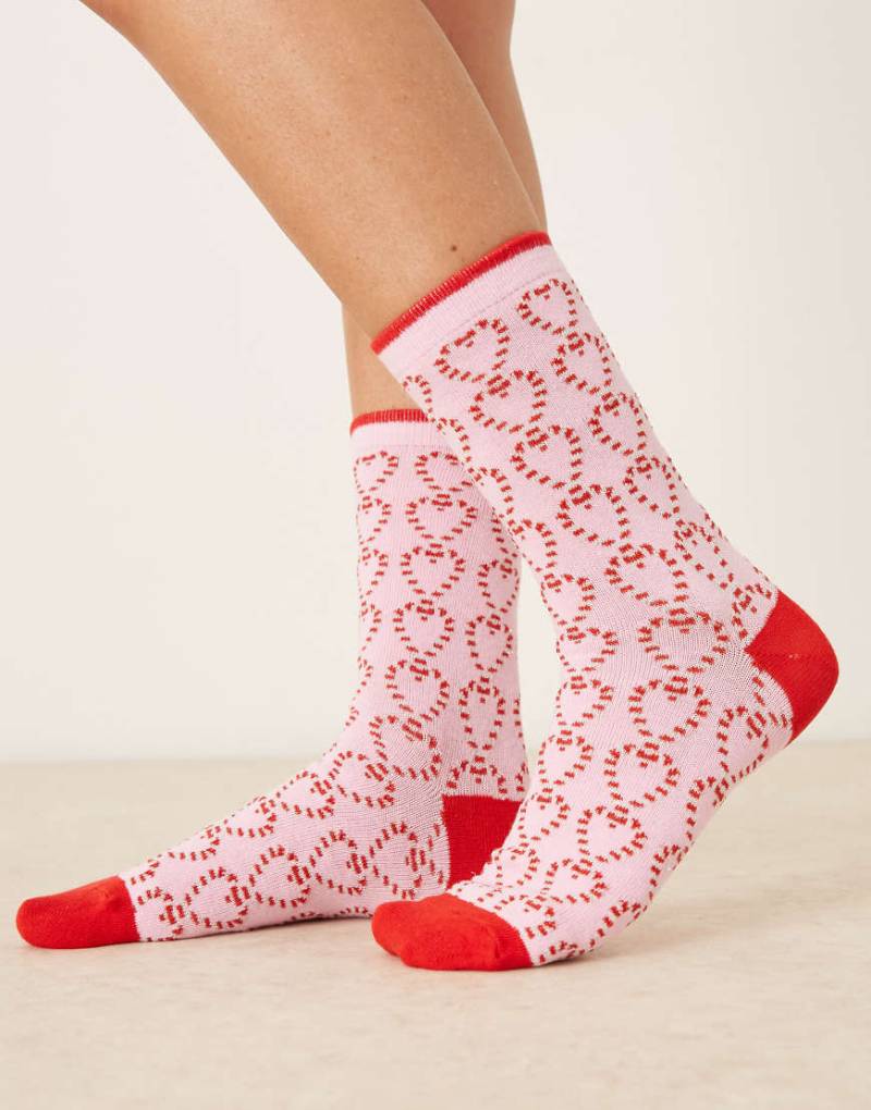 Accessorize - Socken in Rosa mit weihnachtlichem Zuckerstangen-Muster Accessorize - Socken in Rosa mit weihnachtlichem Zuckerstangen-Muster von Accessorize