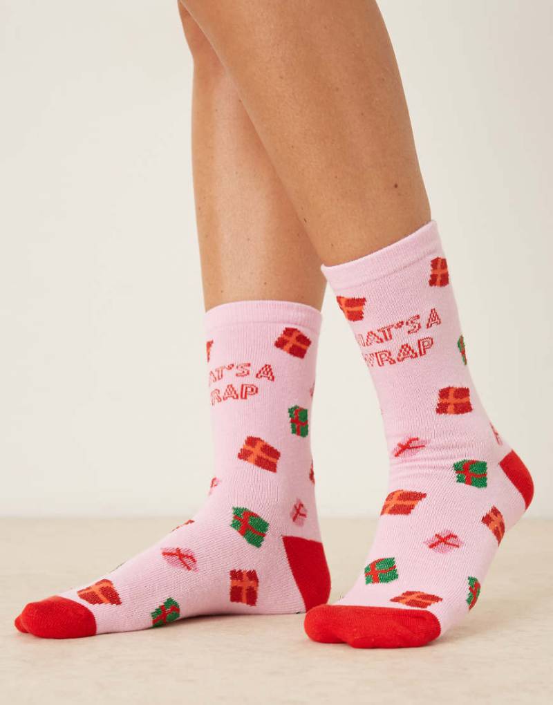 Accessorize - Weihnachten - Socken in Rosa mit Geschenke-Print und „That's A Wrap"-Schriftzug Accessorize - Weihnachten - Socken in Rosa mit Geschenke-Print und „That's A Wrap"-Schriftzug von Accessorize