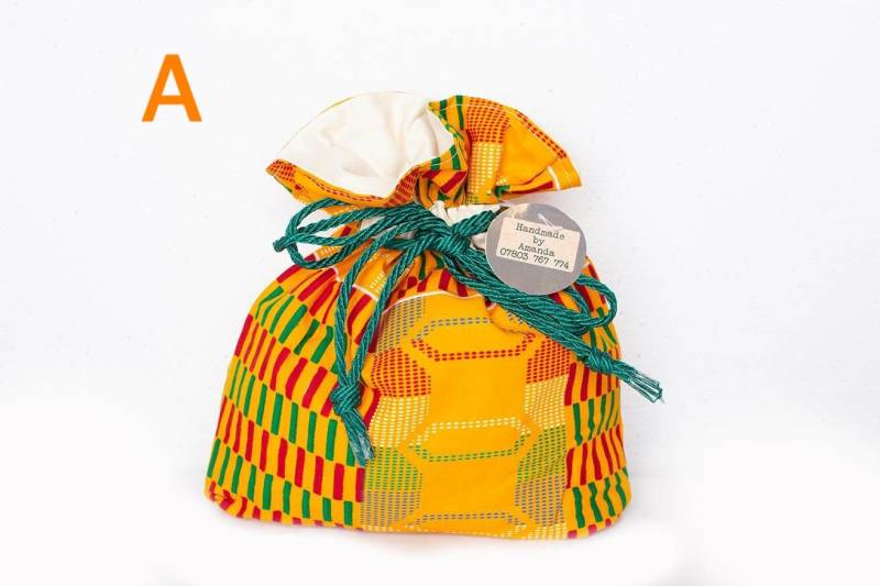 Ankara Print Kordelzugbeutel Lebendige, Mit Baumwolle Gefütterte Tasche Ankara Print Kordelzugbeutel Lebendige, Mit Baumwolle Gefütterte Tasche von AfSpire