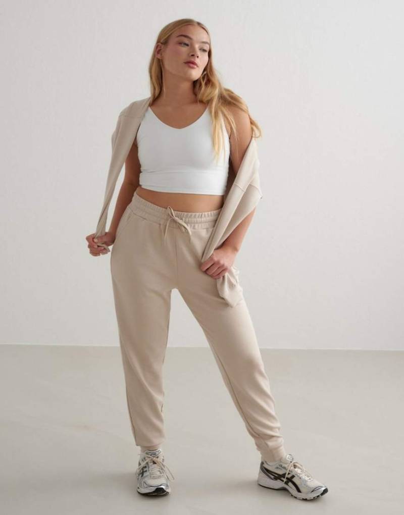 Aim'n - Bequeme Hose aus Modal in Café-au-Lait-Beige mit weitem Bein-Neutral von Aim'n