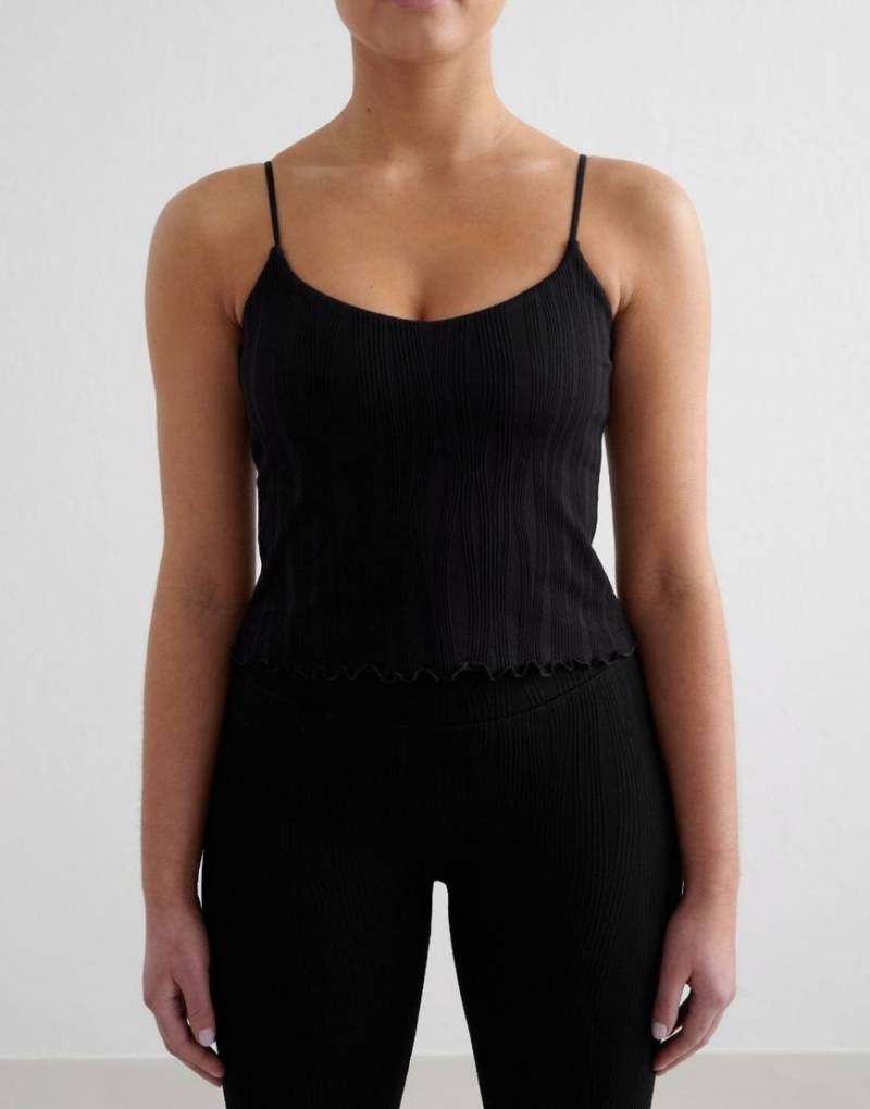 Aim'n - Black Tulip - Sport-Trägertop in Schwarz Aim'n - Black Tulip - Sport-Trägertop in Schwarz von Aim'n