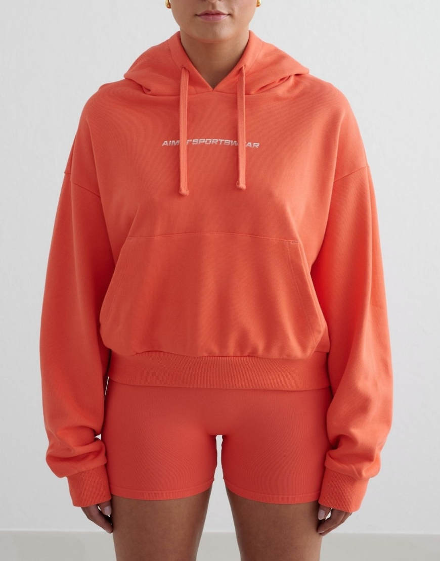 Aim'n - Dicker Kapuzenpullover aus Terry-Stoff in Mandarinen-Orange Aim'n - Dicker Kapuzenpullover aus Terry-Stoff in Mandarinen-Orange von Aim'n