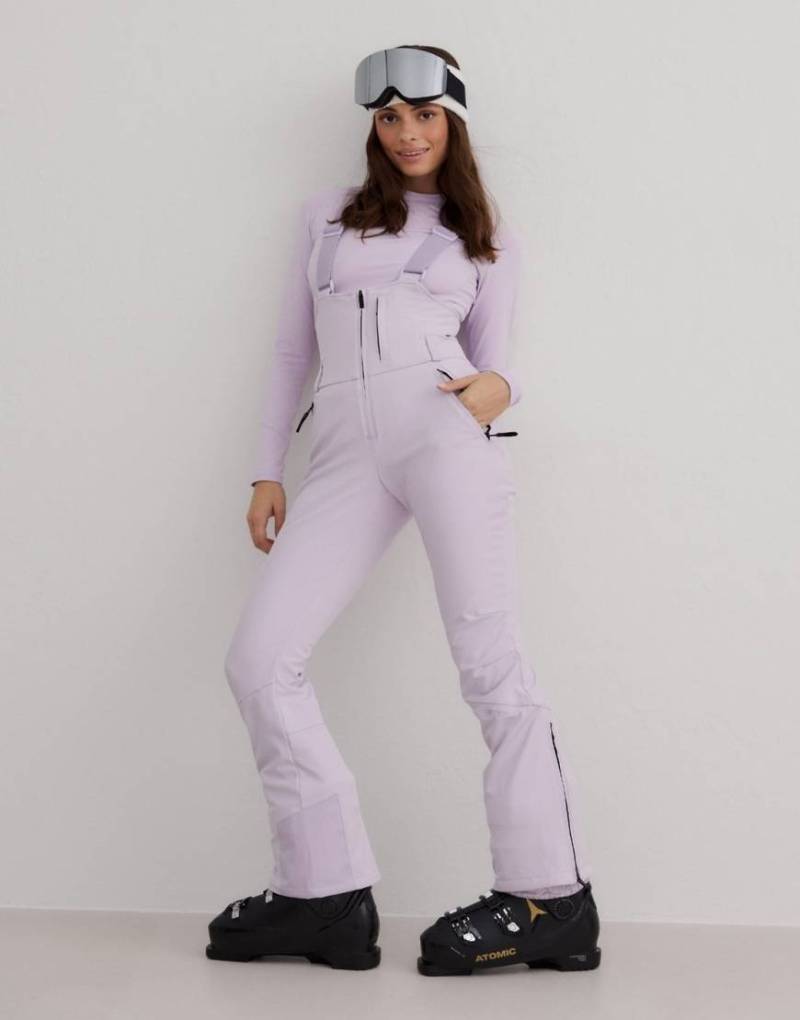 Aim'n - Elastische Thermo-Latzhose in blassem Lavendel-Lila von Aim'n