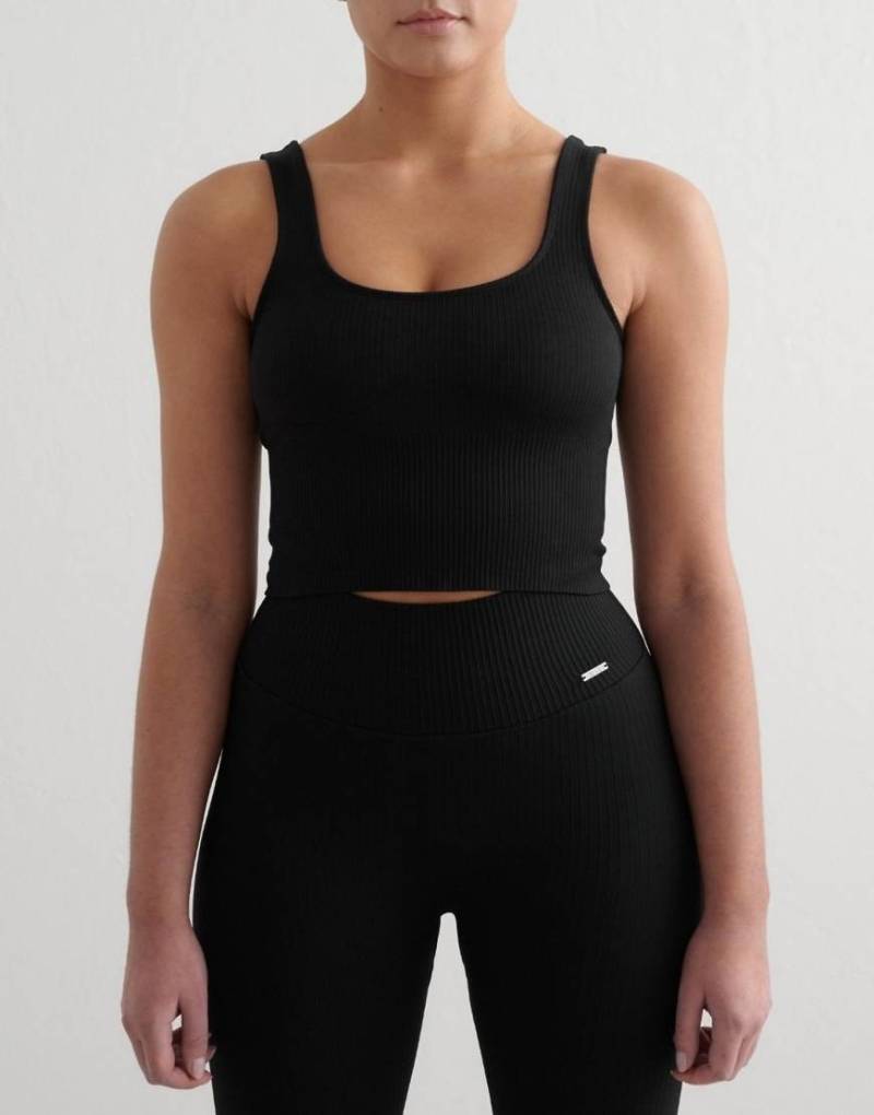 Aim'n - Geripptes, nahtloses Bustier in Schwarz mit figurformendem Design von Aim'n