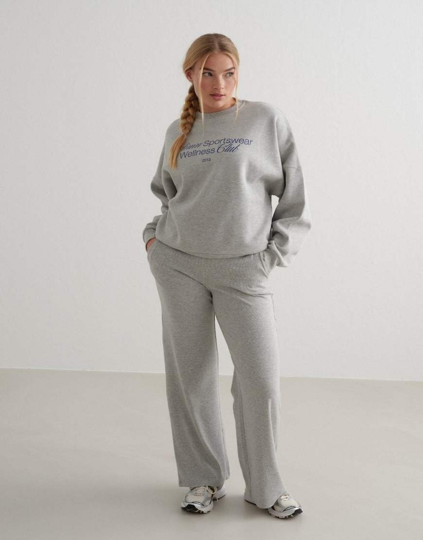 Aim'n - Sweatshirt in meliertem Grau mit „Wellness"-Print von Aim'n