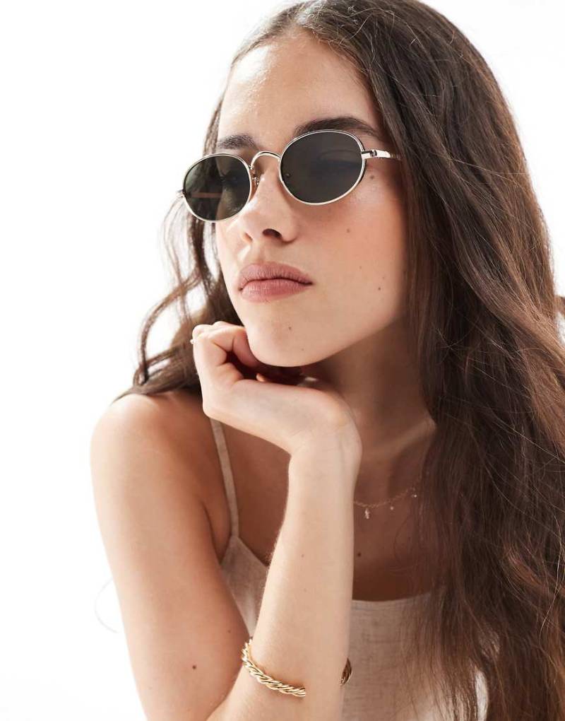 Aire - Regulus - Sonnenbrille mit rundem Metallgestell in Grün mit Gläsern in Gold-Goldfarben von Aire