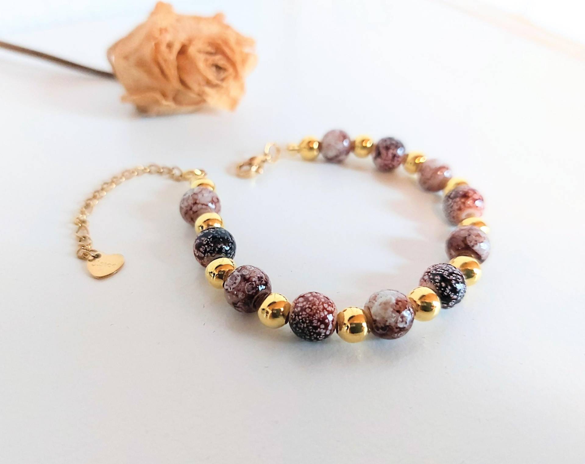 Unikat Herbstliches Perlenarmband Kaffee Rotbraun Glasperlen + Goldfarbene Edelstahlperlen Größe S-L Unikat Herbstliches Perlenarmband Kaffee Rotbraun Glasperlen + Goldfarbene Edelstahlperlen Größe S-L von AlisasSchatztruhe