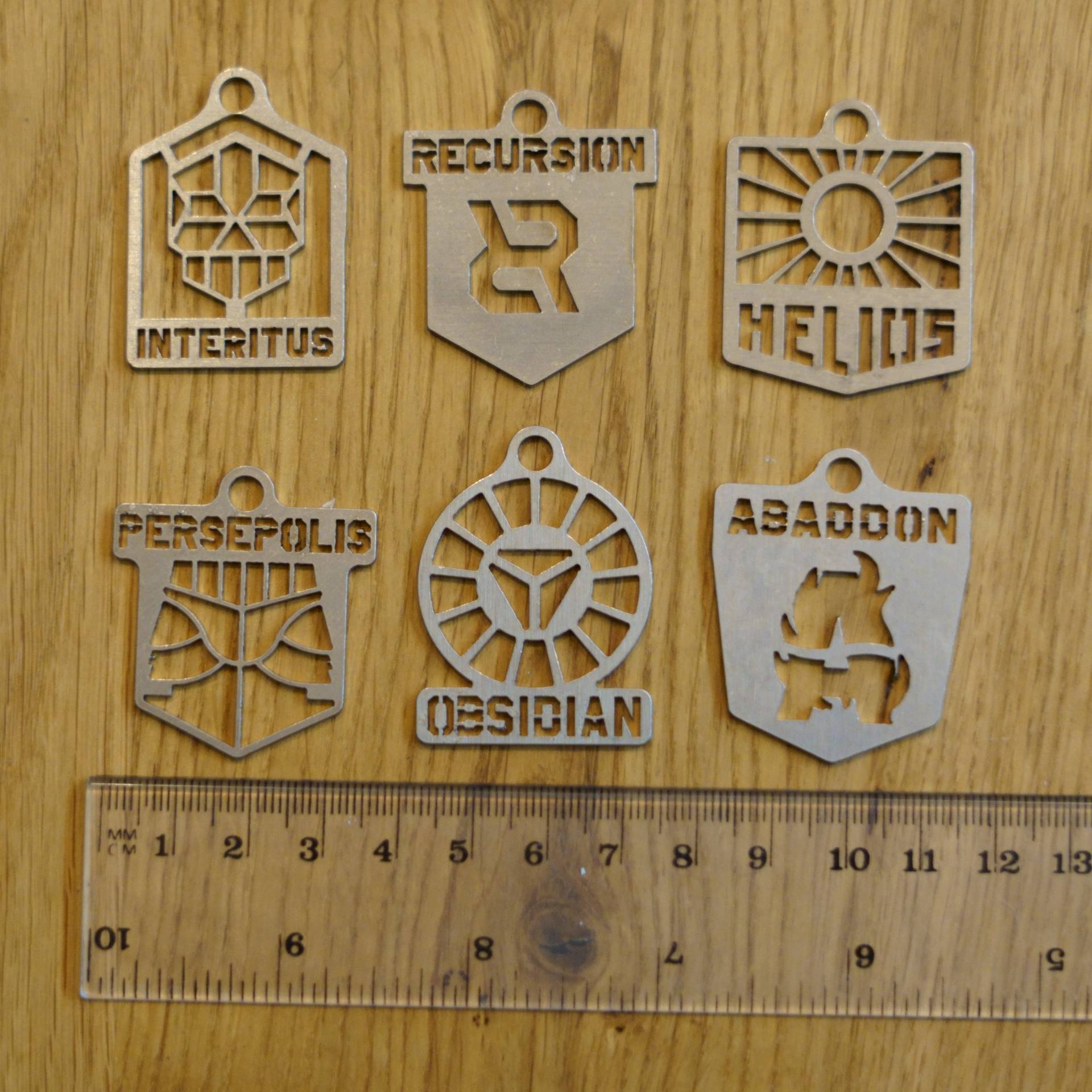 Anomaly Ingress Stahl Anhänger Badges Logo Interitus Helios Recursion Persepolis Obsidian Abaddon von AlkaliaSwag