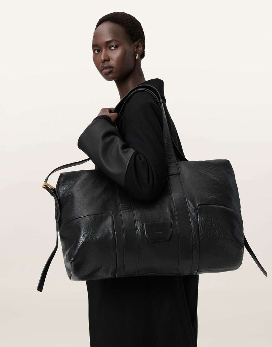 AllSaints - Ares - Genarbte Reisetasche in Schwarz von AllSaints