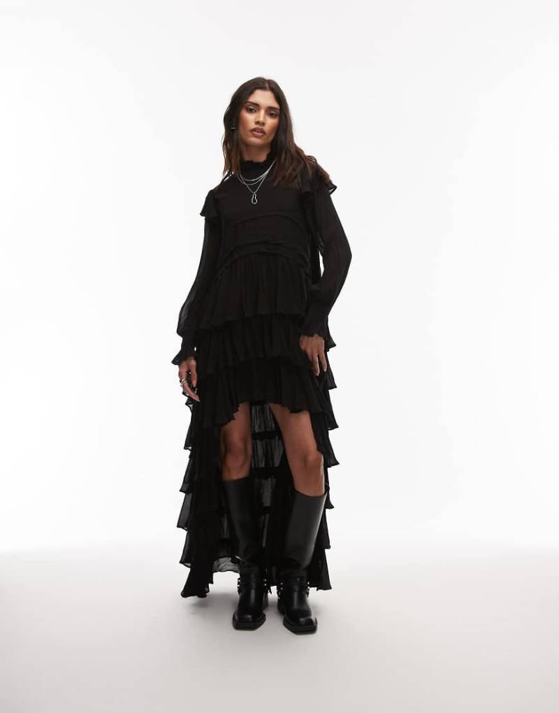 AllSaints - Cavarly - Langärmliges gestuftes Maxikleid in Schwarz mit Rüschen AllSaints - Cavarly - Langärmliges gestuftes Maxikleid in Schwarz mit Rüschen von AllSaints