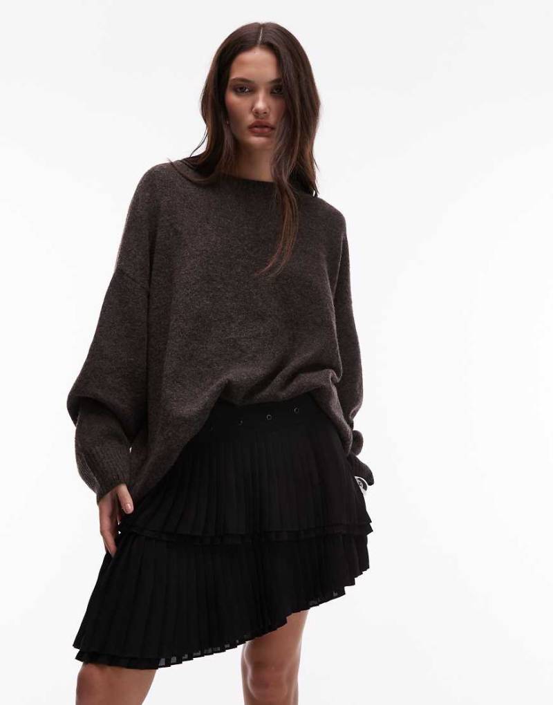 AllSaints - Oona - Kurzer Faltenrock in Schwarz mit Ösen am Bund von AllSaints