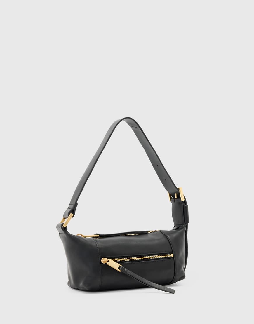 AllSaints - Vega - Mini-Schultertasche aus Leder in Schwarz-Rot AllSaints - Vega - Mini-Schultertasche aus Leder in Schwarz-Rot von AllSaints