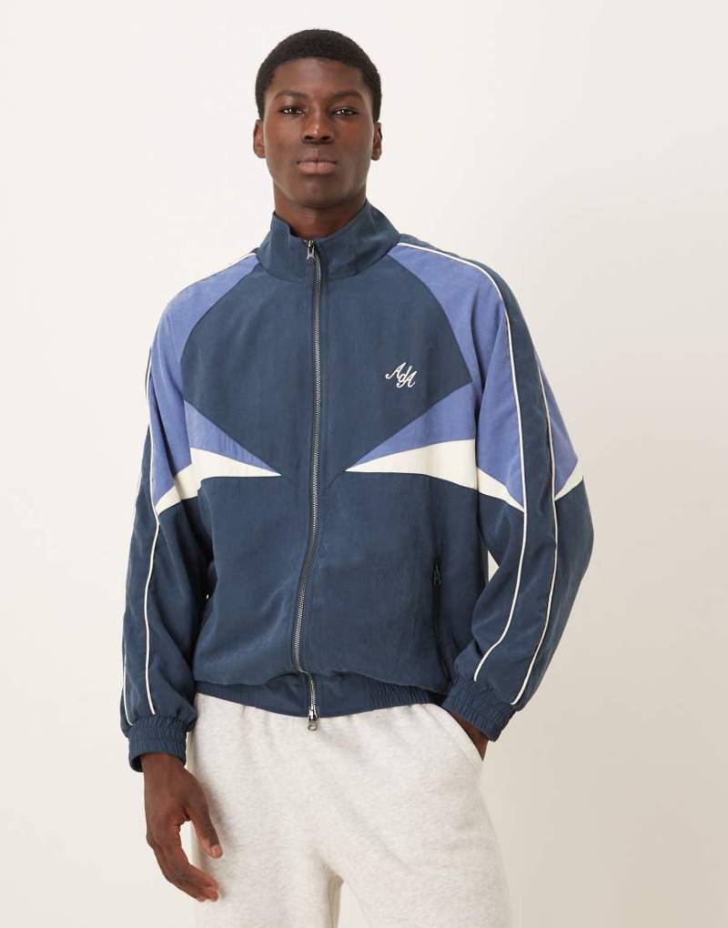 Alma De Ace - Alora - Trainingsjacke in Marineblau mit Reißverschluss und Colourblock-Design von Alma De Ace