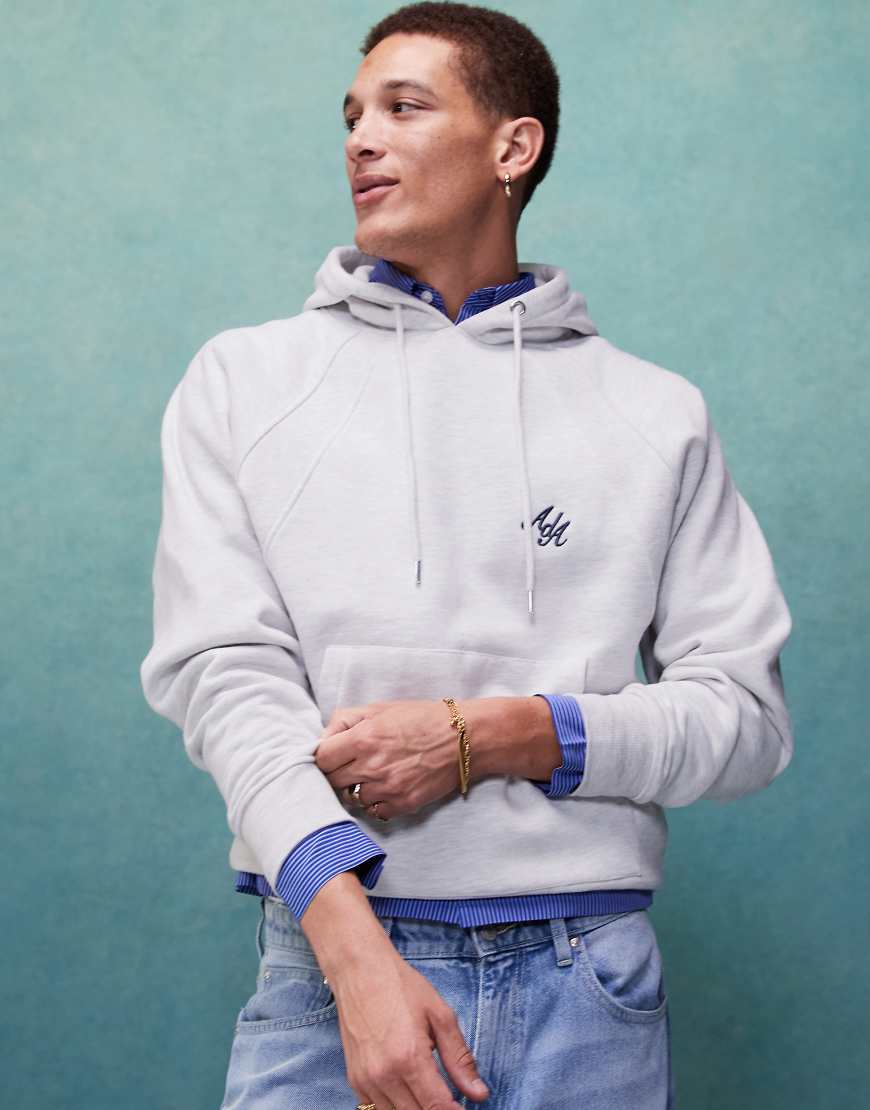 Alma de Ace - Kapuzenpullover in Grau meliert mit Logostickerei Alma de Ace - Kapuzenpullover in Grau meliert mit Logostickerei von Alma De Ace