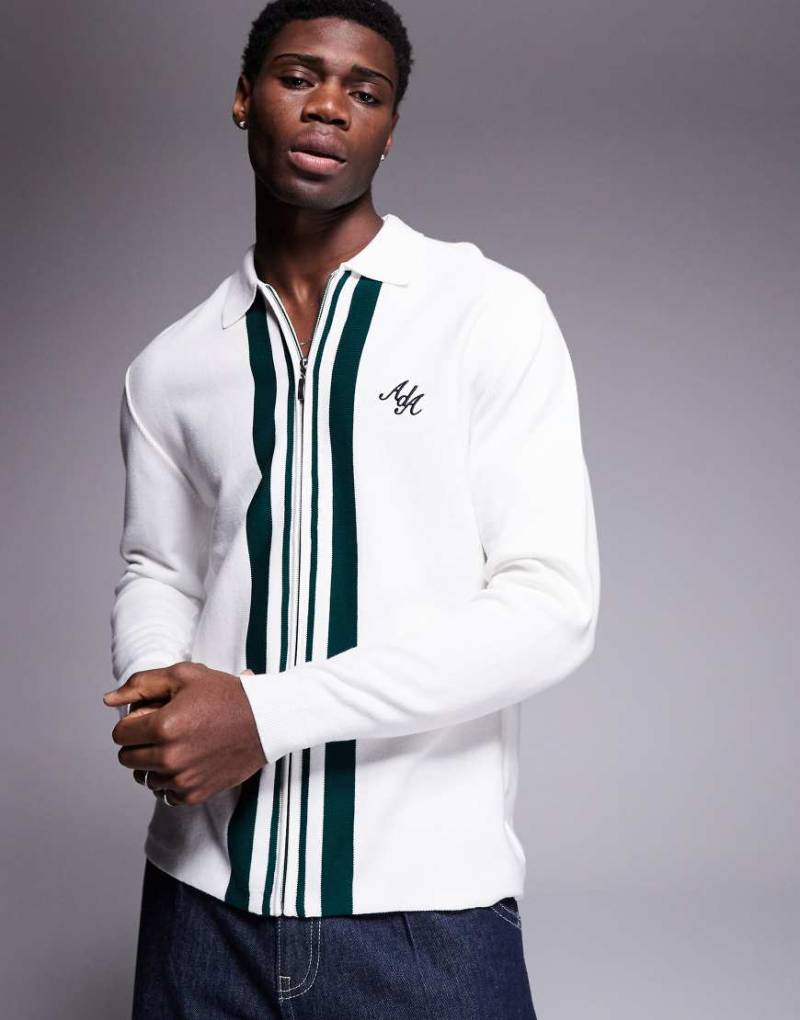 Alma de Ace - Strickjacke in Creme mit Streifendetail und Logo-Weiß von Alma De Ace