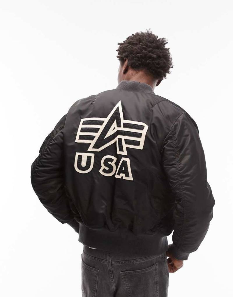 Alpha Industries - MA-1 - Bomberjacke in Schwarz mit Used-Optik und Logo am Rücken von Alpha Industries