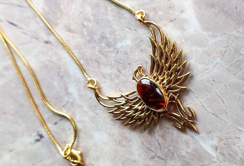 Phönix, Anhänger Mit Rotem Bernstein Phönix, Anhänger Mit Rotem Bernstein von Amanur