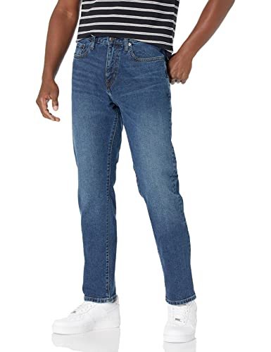 Amazon Essentials Herren Stretchjeans mit lockerer Passform (in Übergrößen erhältlich), Mittlere Waschung, 44W / 30L von Amazon Essentials