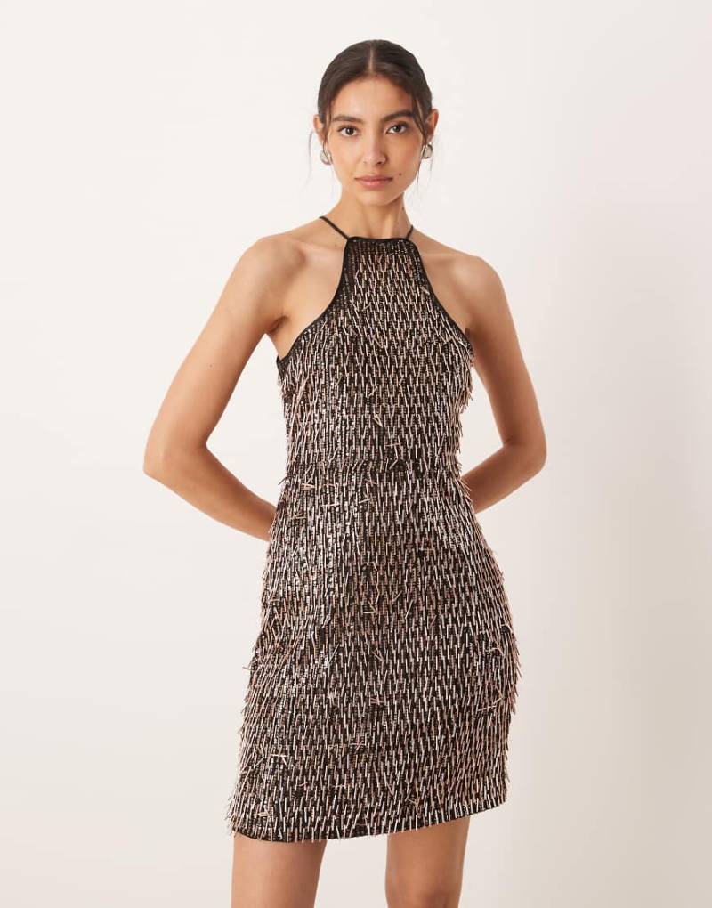 Amy Lynn - Minikleid in Schwarz und Gold mit welligen Pailletten und Aussparung von Amy Lynn