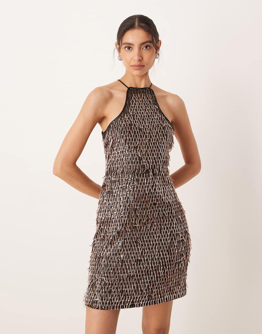 Amy Lynn - Minikleid in Schwarz und Gold mit welligen Pailletten und Aussparung von Amy Lynn