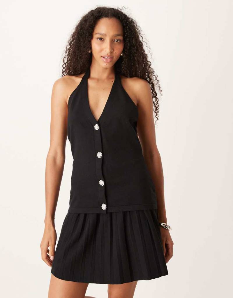 Amy Lynn - Neckholder-Oberteil aus Strick in Schwarz mit Strassknöpfen von Amy Lynn