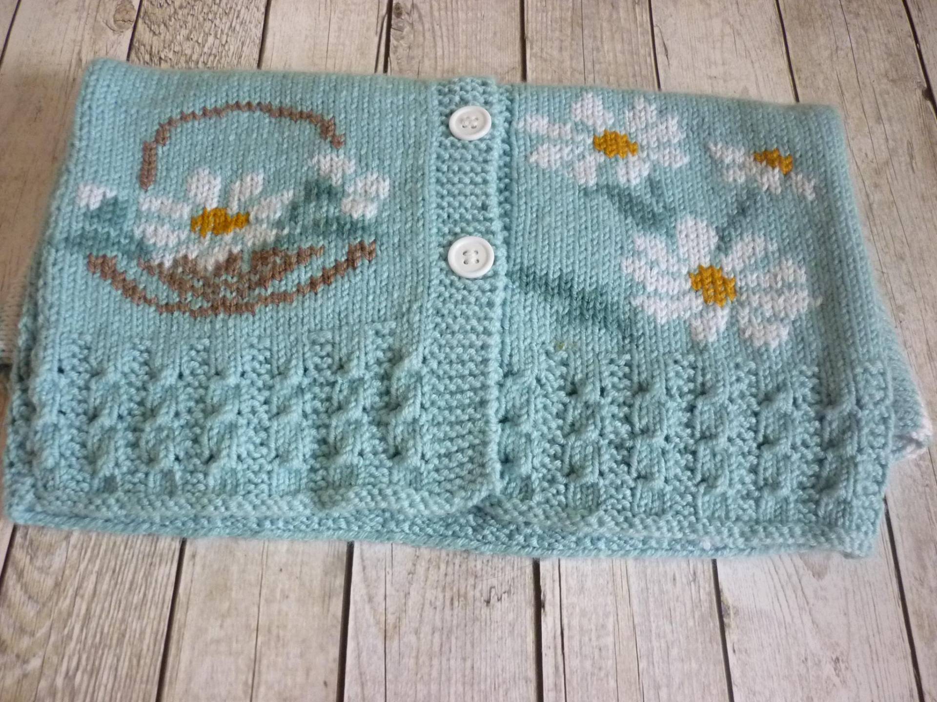 Handgestrickte Baby Strickjacke Gänseblümchen von AnaSwet