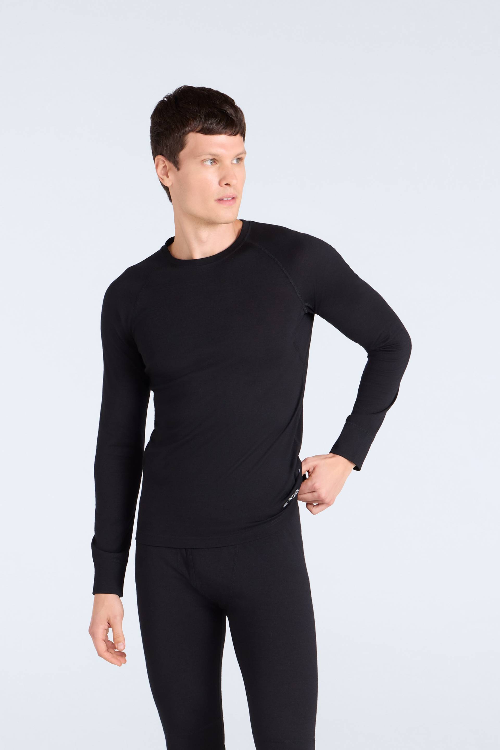 Herren-Baselayer-Oberteil aus Merinowolle - Schwarz Herren-Baselayer-Oberteil aus Merinowolle - Schwarz von Animal