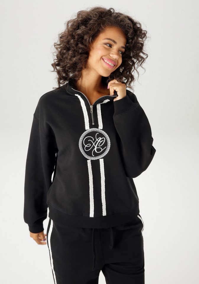 Aniston CASUAL Sweatshirt aufwändig mit Stickerei und Spitzenbändern verziert - NEUE KOLLEKTION Aniston CASUAL Sweatshirt aufwändig mit Stickerei und Spitzenbändern verziert - NEUE KOLLEKTION von Aniston CASUAL