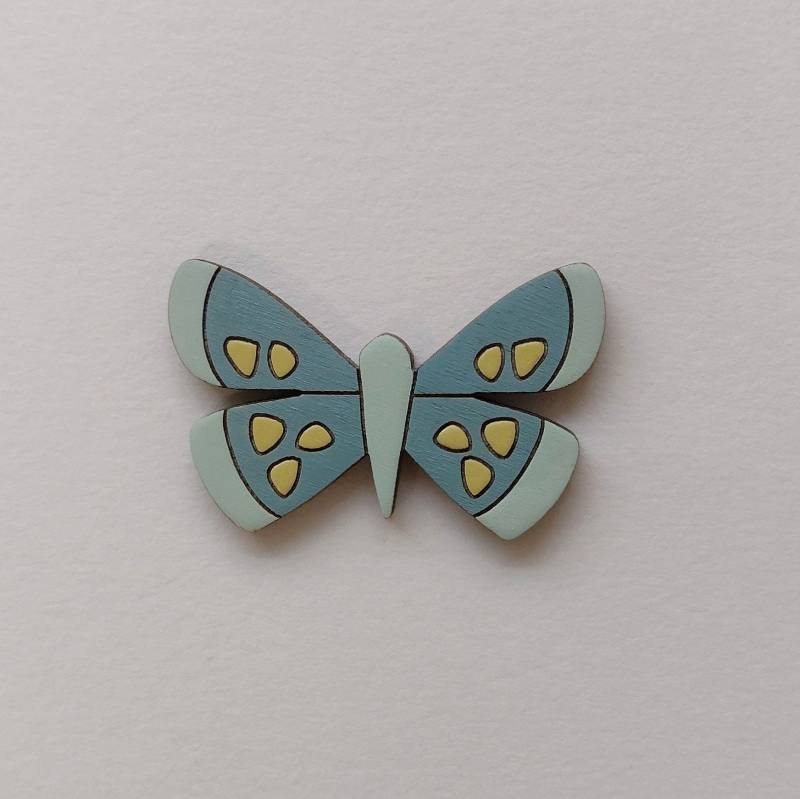 Blau Gesprenkelte Schmetterling-Brosche Handbemalte Holzbrosche Blau Gesprenkelte Schmetterling-Brosche Handbemalte Holzbrosche von AnnaWiscombe