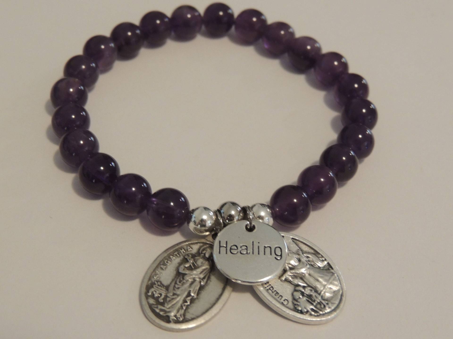st Agatha Brustkrebs Schirmherr Amethyst Healing Charm Armband st Agatha Brustkrebs Schirmherr Amethyst Healing Charm Armband von AnneGaleJewels
