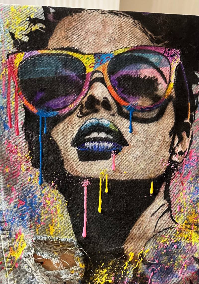 Customized Hand Painted Distressed Oversized Denim Blue Jacket With A Motif Of Large Image Girl Sunglasses in Street Art Style von AnneGraceArt