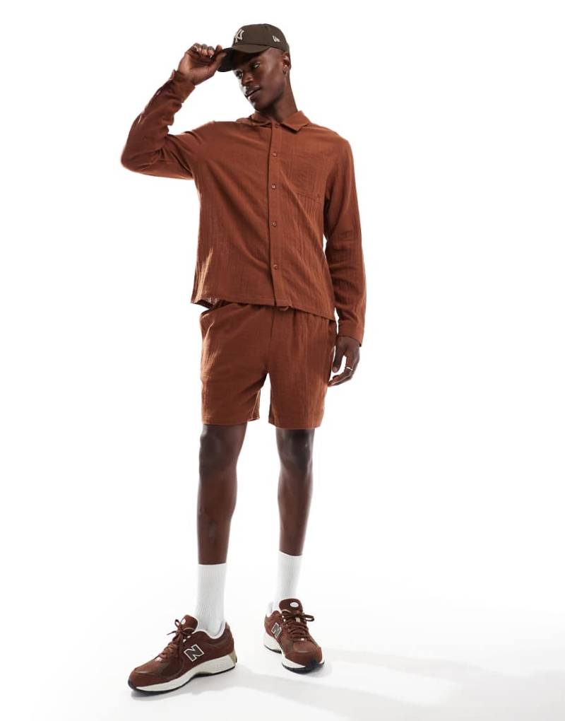 Another Influence - Locker geschnittene Shorts aus Musselin-Stoff in Terrakotta, Kombiteil-Orange von Another Influence