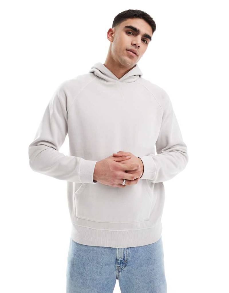 Another Influence - Regan - Kapuzenpullover in grauer Acid-Waschung mit Kontrastnaht von Another Influence