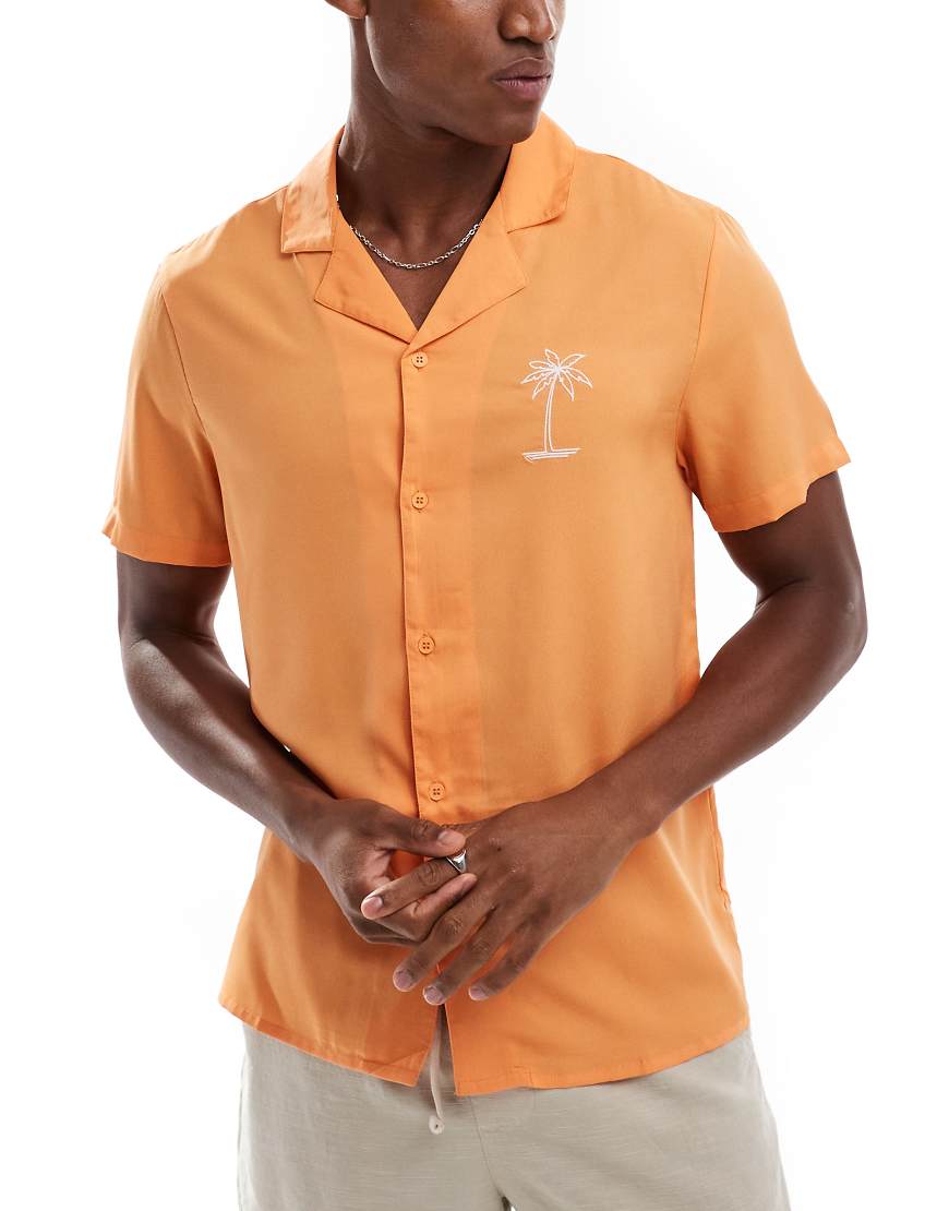 Another Influence - Strandhemd in Apricot mit Palmen-Stickerei-Orange Another Influence - Strandhemd in Apricot mit Palmen-Stickerei-Orange von Another Influence