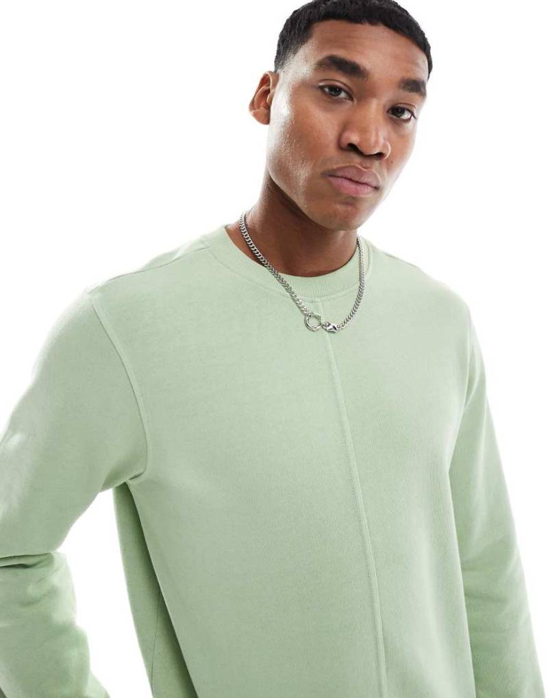 Another Influence - Sweatshirt in Grün mit Acid-Waschung und Nahtdetails von Another Influence