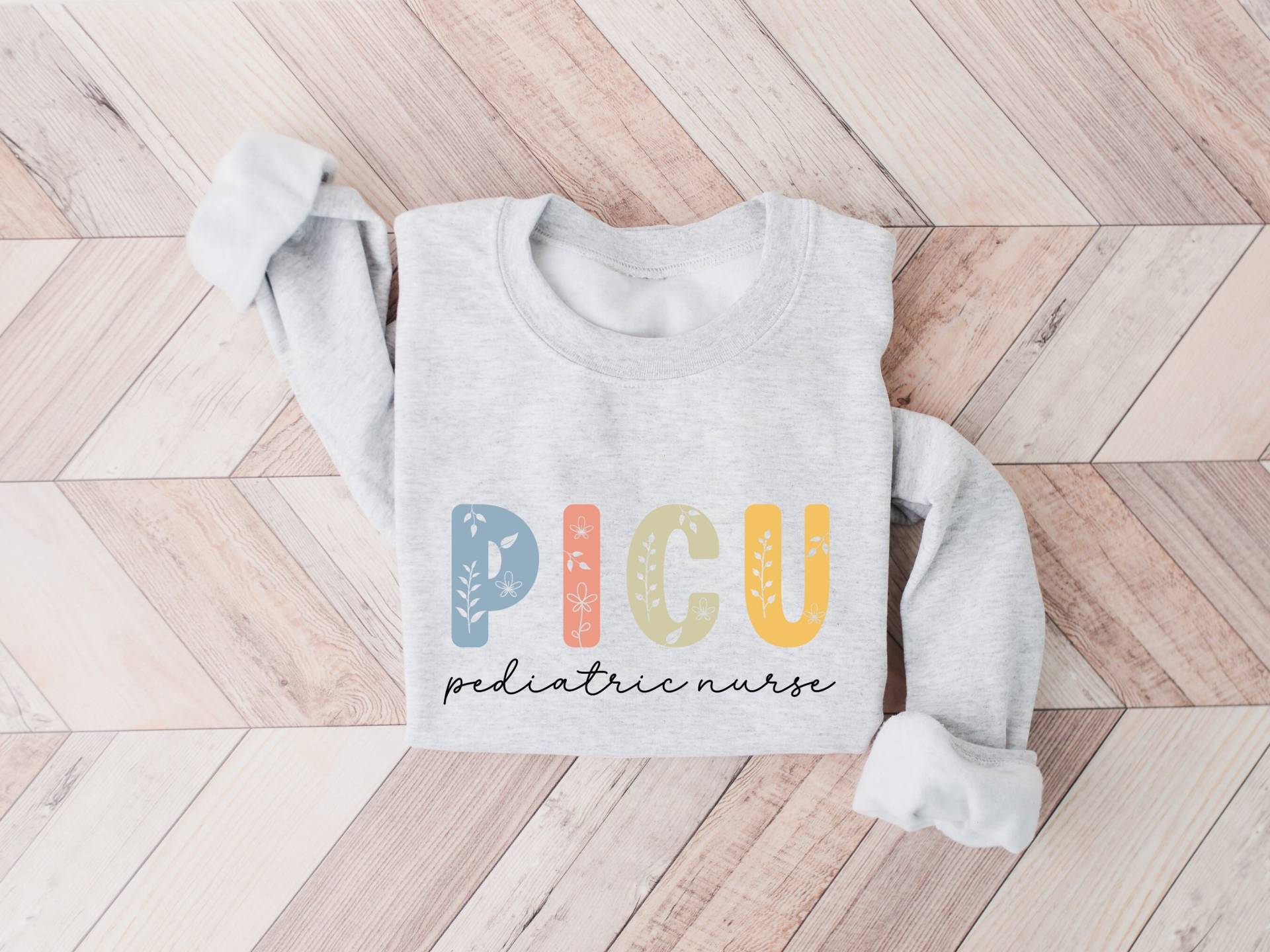 Picu Kinderkrankenschwester Blumen Sweatshirt, Geschenk, Kinderkrankenhaus, Peds Krankenschwester, Krankenpflegeschule, Bunter Kinderarzt von Archaro