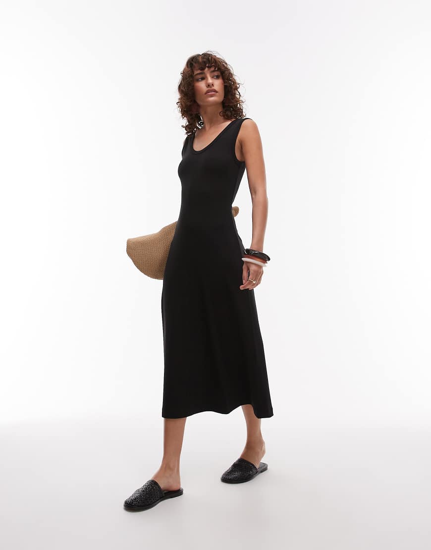 ARKET - Ärmelloses Midikleid aus kompaktem Rippstoff in Schwarz ARKET - Ärmelloses Midikleid aus kompaktem Rippstoff in Schwarz von Arket