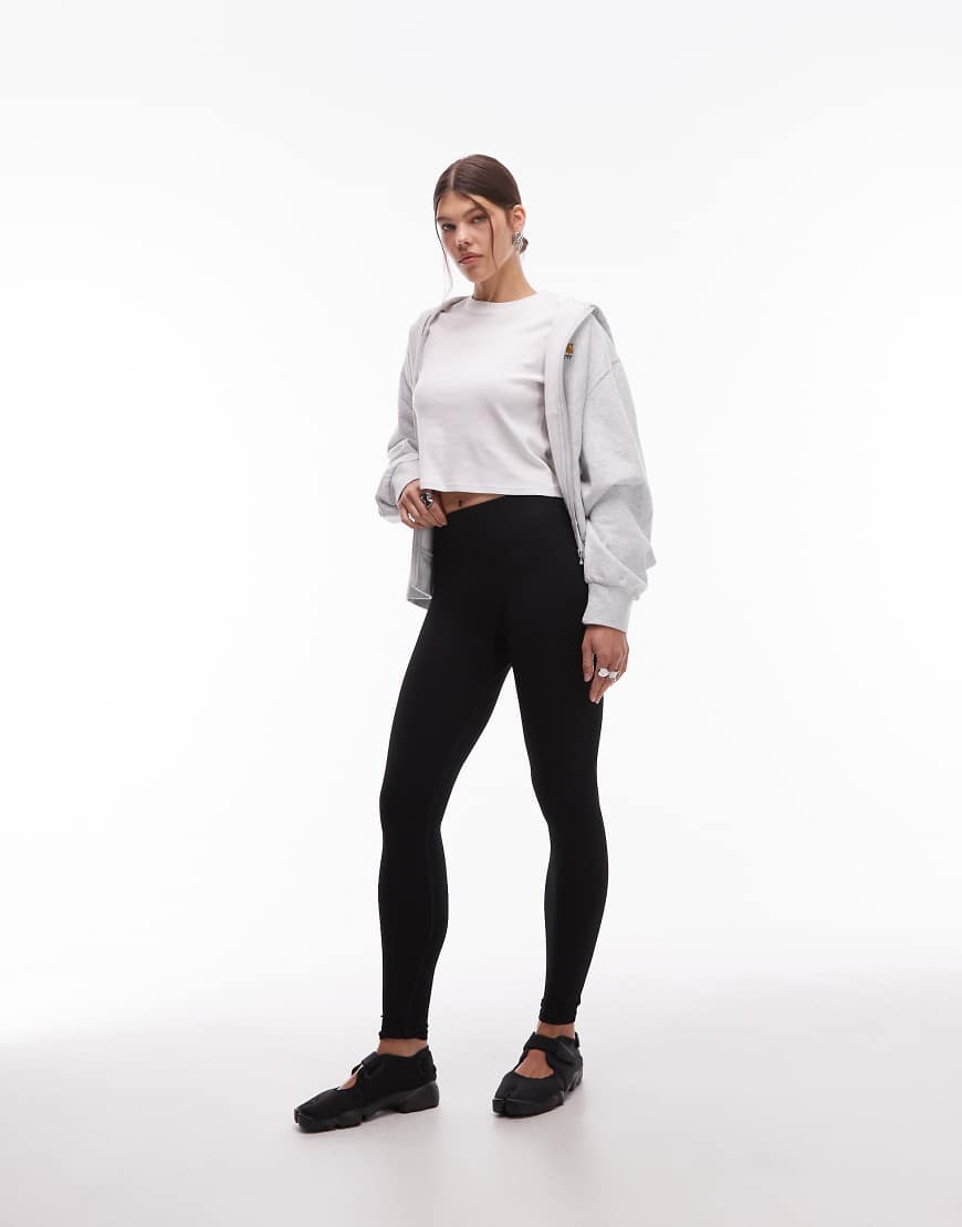ARKET - Exklusiv bei ASOS - Nahtlose, super-elastische Sport-Leggings in Schwarz von Arket