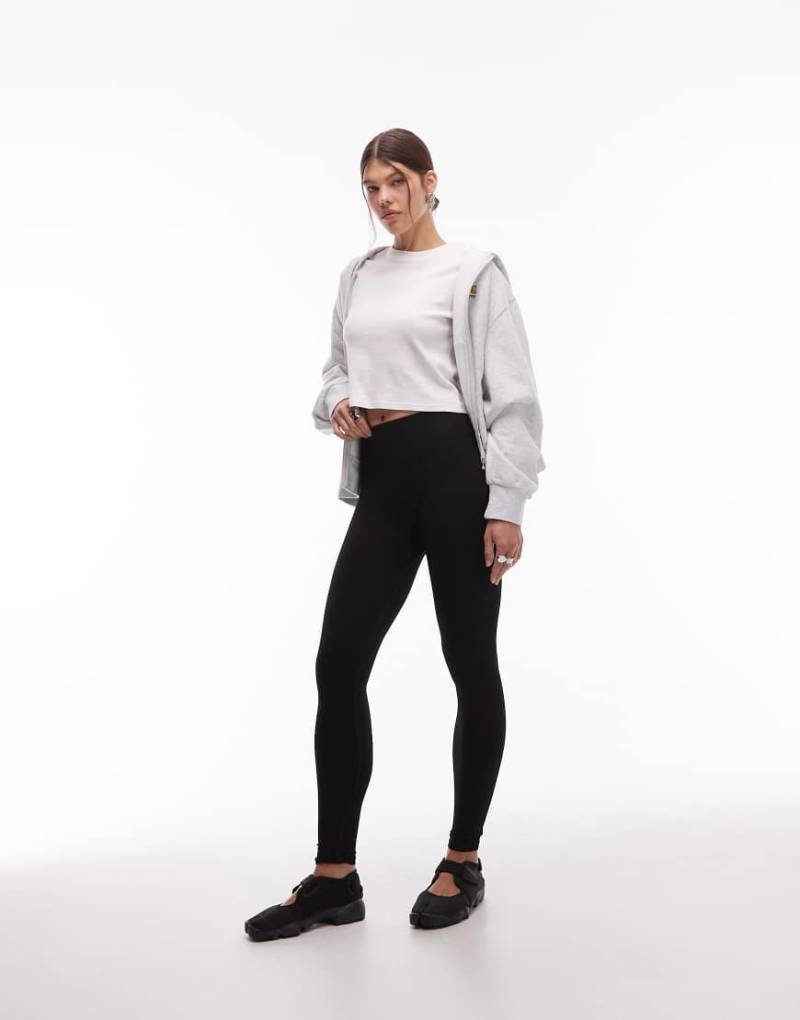 ARKET - Exklusiv bei ASOS - Nahtlose, super-elastische Sport-Leggings in Schwarz von Arket