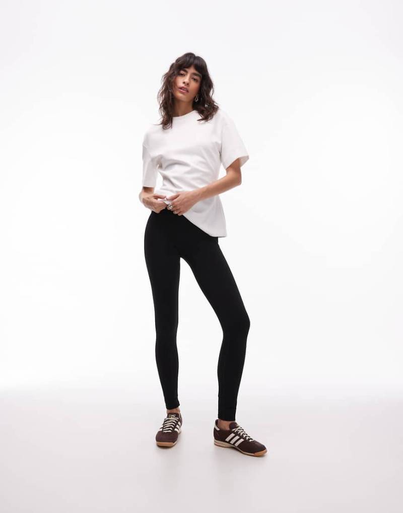 ARKET - Exklusiv bei ASOS - Nahtlose, super-elastische Sport-Leggings in Schwarz von Arket