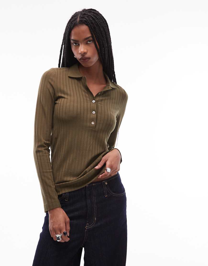 ARKET - Geripptes Oberteil aus Stretch-Jersey in Khaki mit langer Knopfleiste und Polokragen-Schwarz ARKET - Geripptes Oberteil aus Stretch-Jersey in Khaki mit langer Knopfleiste und Polokragen-Schwarz von Arket