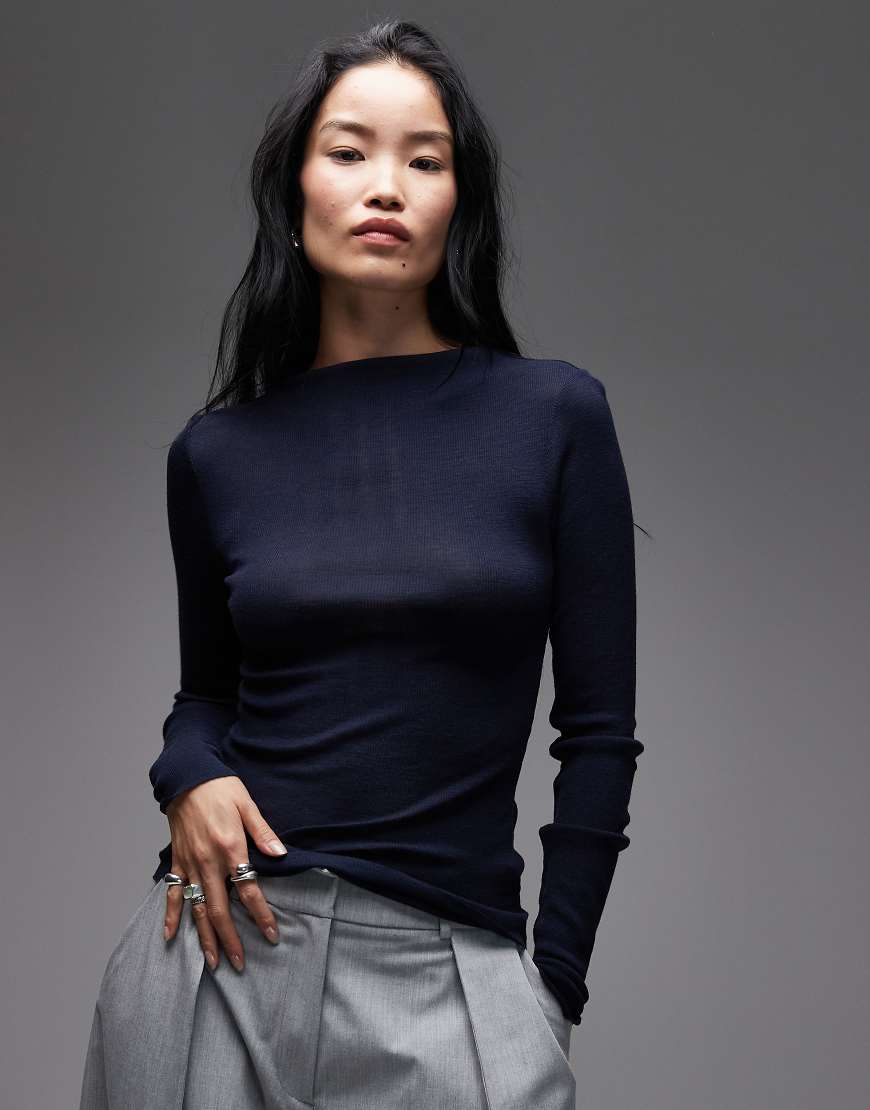 ARKET - Halbtransparentes Strickoberteil aus Merinowolle in Blau mit breitem Rippenmuster und Stehkragen von Arket