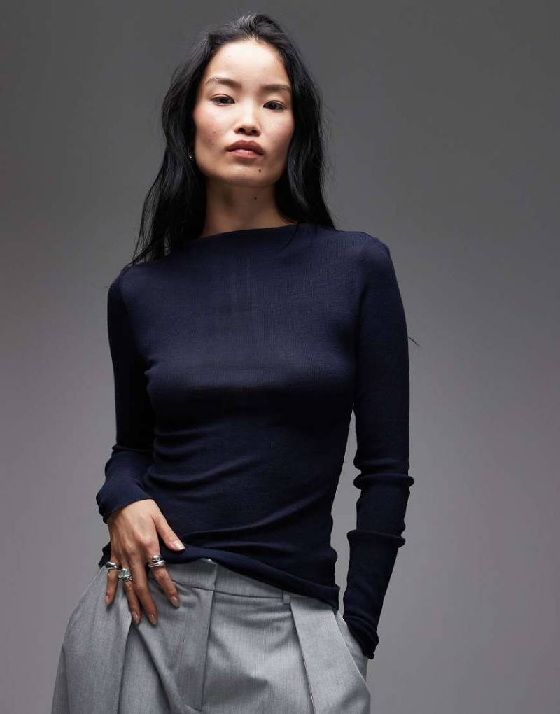 ARKET - Halbtransparentes Strickoberteil aus Merinowolle in Blau mit breitem Rippenmuster und Stehkragen von Arket