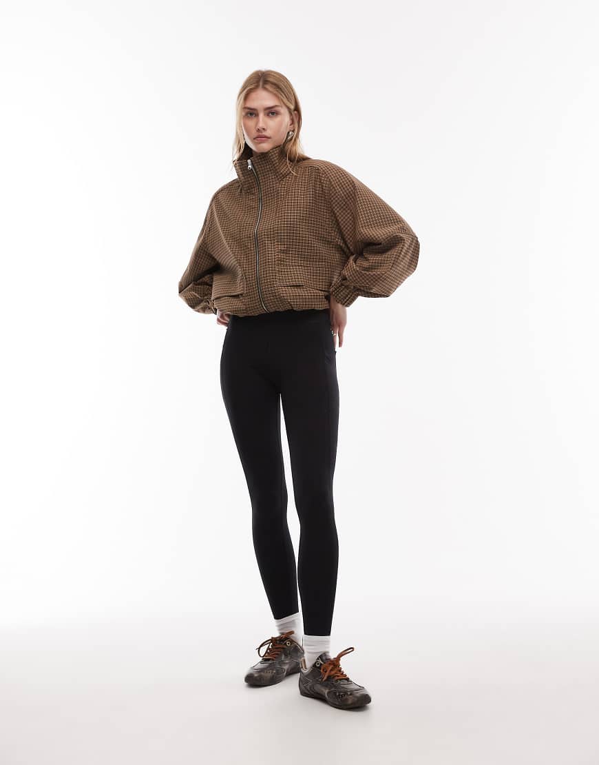 ARKET - Nahtlose Sport-Leggings in Schwarz mit Seitentaschen von Arket