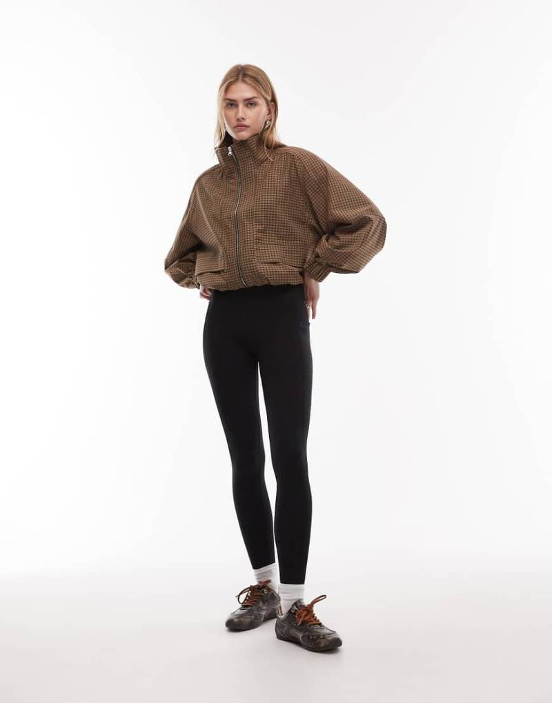ARKET - Nahtlose Sport-Leggings in Schwarz mit Seitentaschen von Arket