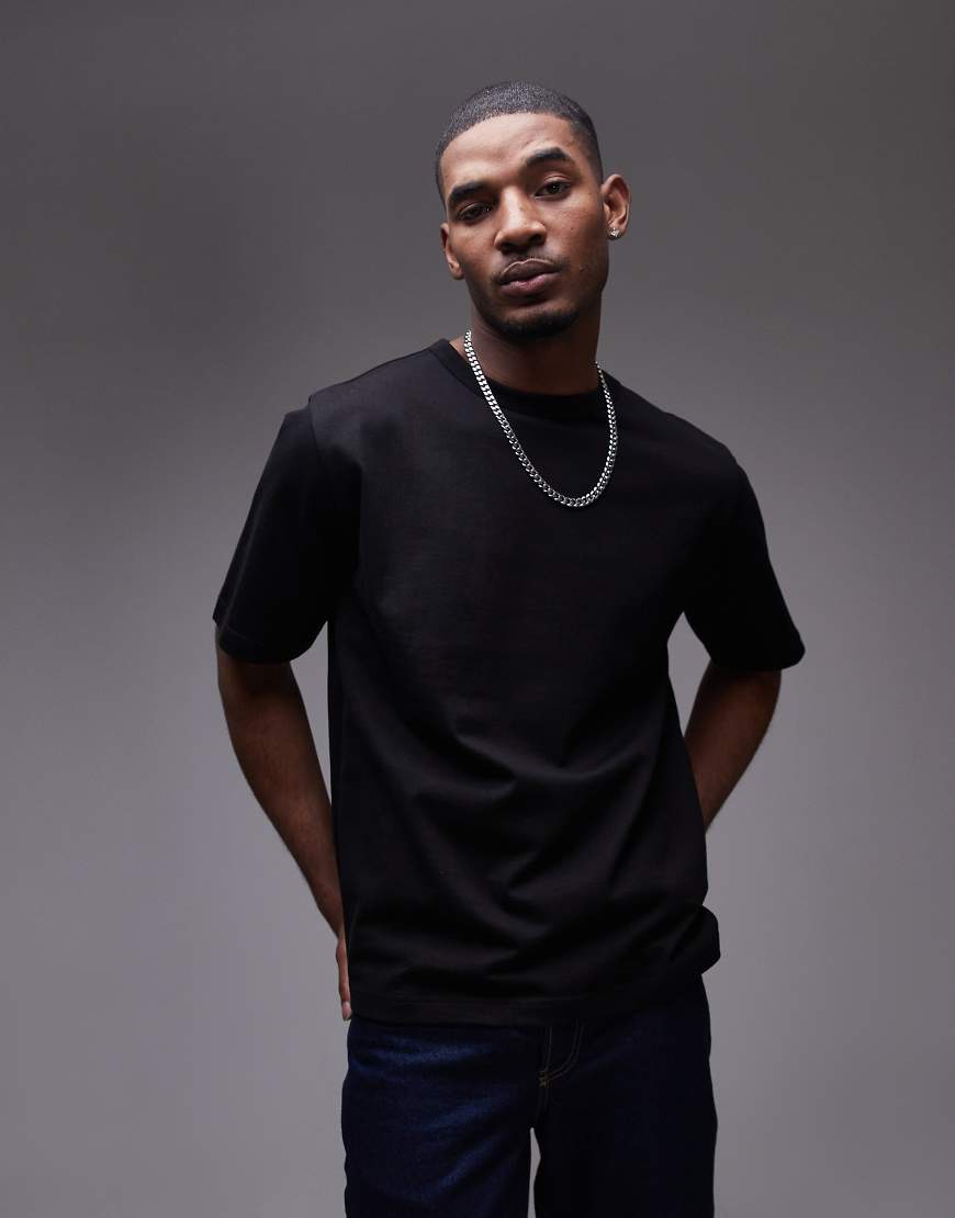 ARKET - Oversize-T-Shirt aus schwerem Jersey in Schwarz ARKET - Oversize-T-Shirt aus schwerem Jersey in Schwarz von Arket