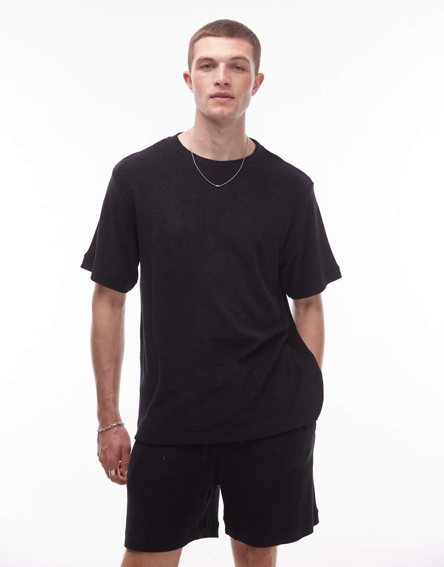 ARKET - Weiches Frottee-T-Shirt aus reiner Baumwolle in Schwarz mit Oversize-Schnitt, Kombiteil von Arket