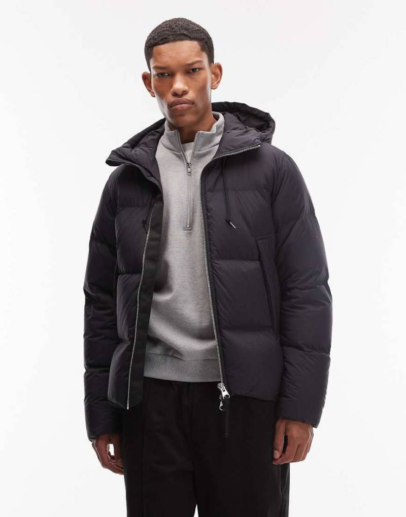 ARKET - Pufferjacke in Schwarz mit Daunenfüllung und Kapuze von Arket