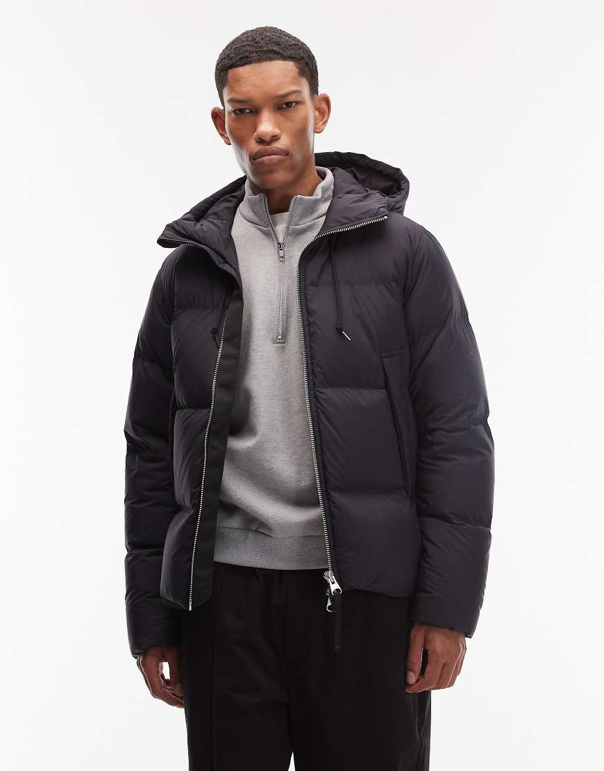 ARKET - Pufferjacke in Schwarz mit Daunenfüllung und Kapuze von Arket